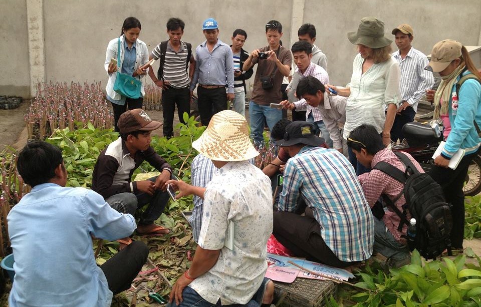 AfID volunteer with charity partners in Cambodia